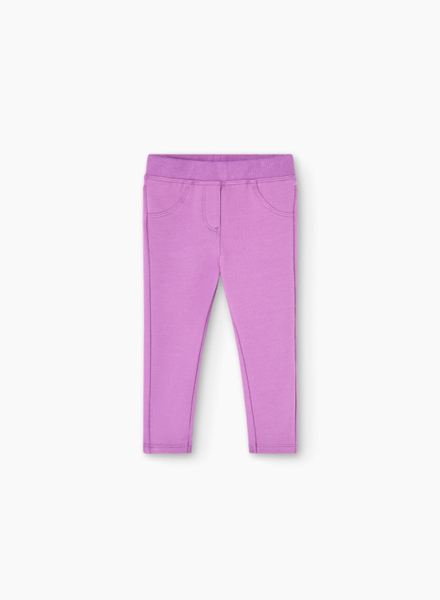 Trousers with decorative pockets
